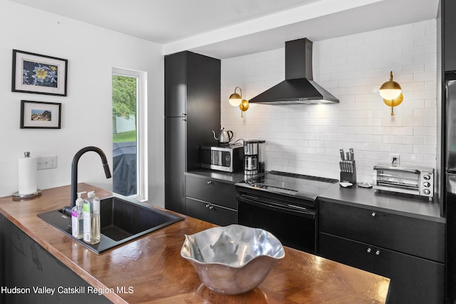 2064 County Highway 8, Denver, NY 12421 - kitchen featuring wall chimney exhaust hood, electric range, stainless steel microwave, and dark cabinets