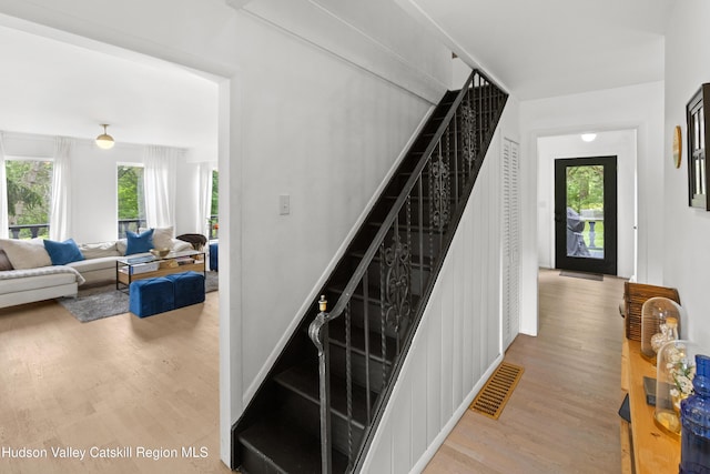 2064 County Highway 8, Denver, NY 12421 - staircase with wood finished floors and healthy amount of natural light