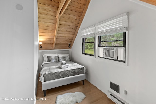 2064 County Highway 8, Denver, NY 12421 - bedroom featuring wood ceiling, cooling unit, wood finished floors, and baseboard heating