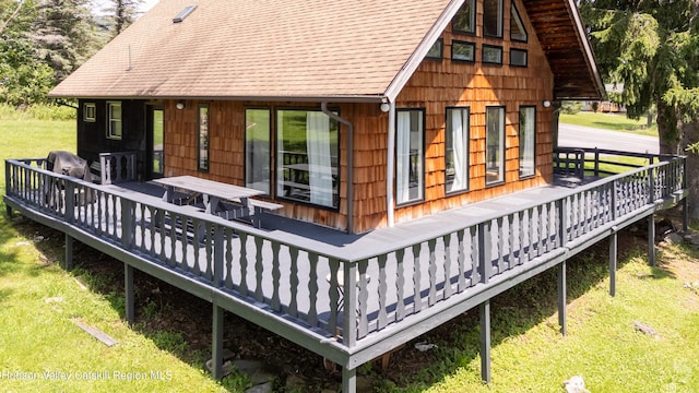 2064 County Highway 8, Denver, NY 12421 - rear view of house featuring a yard, a shingled roof, and a deck