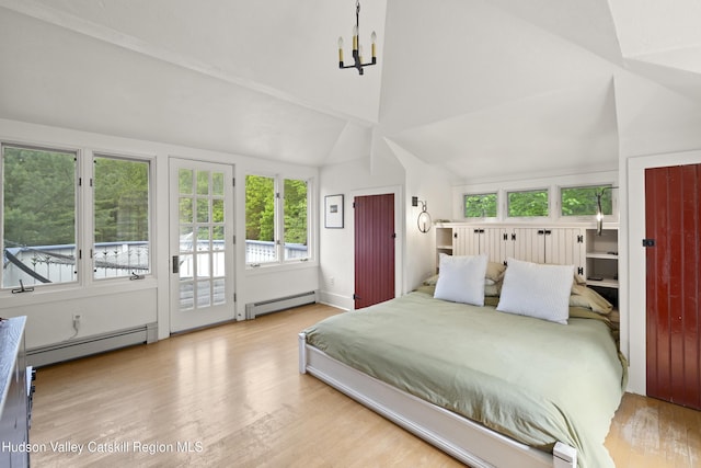 253 Upper Byrdcliffe Rd, Woodstock, NY 12498 - bedroom featuring baseboard heating, access to exterior, wood finished floors, a chandelier, and lofted ceiling