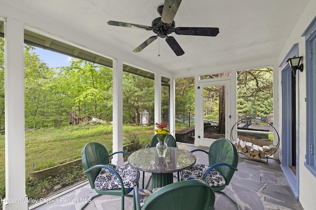 253 Upper Byrdcliffe Rd, Woodstock, NY 12498 - sunroom with a ceiling fan, french doors, and outdoor dining space