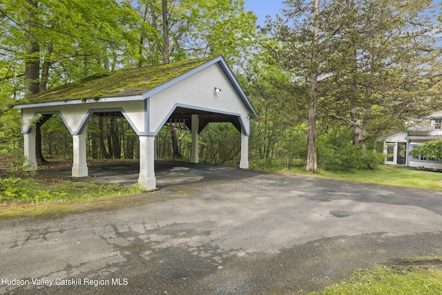 253 Upper Byrdcliffe Rd, Woodstock, NY 12498 - view of vehicle parking featuring asphalt driveway