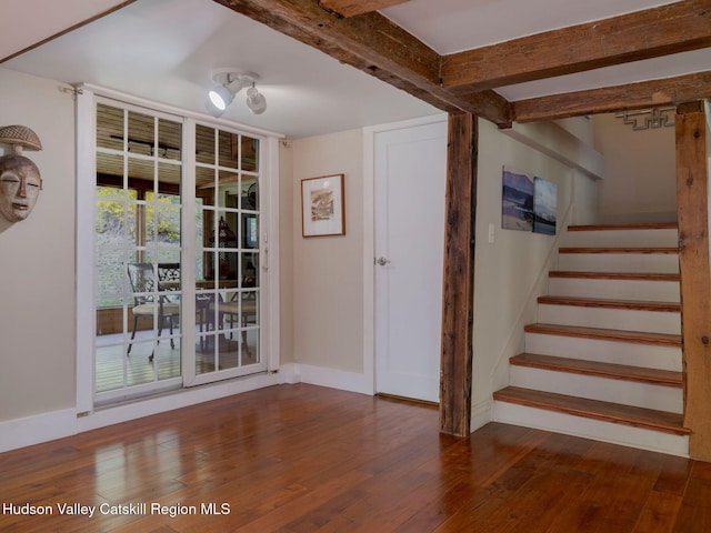 236 Spillway Rd, West Hurley, NY 12491 - entryway featuring wood finished floors, stairs, beamed ceiling, and baseboards