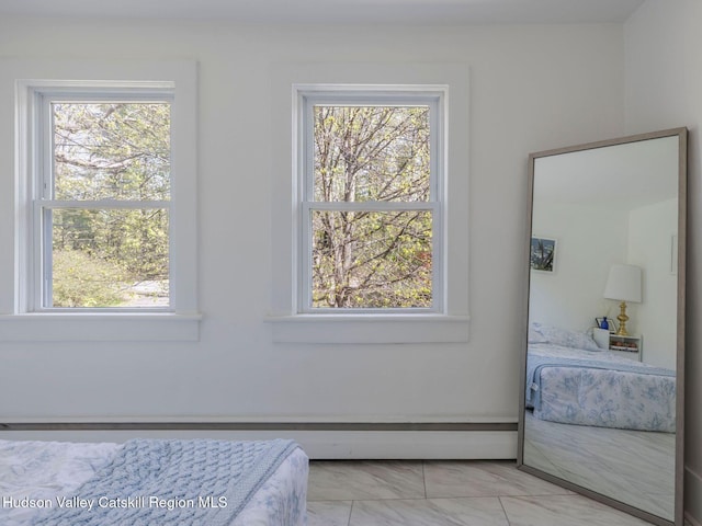 236 Spillway Rd, West Hurley, NY 12491 - bedroom with light marble finish floors