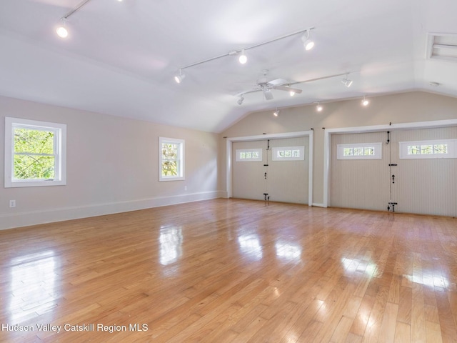 236 Spillway Rd, West Hurley, NY 12491 - entrance foyer featuring track lighting, vaulted ceiling, plenty of natural light, light wood-style flooring, and ceiling fan