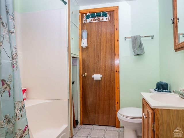 full bath featuring toilet and vanity