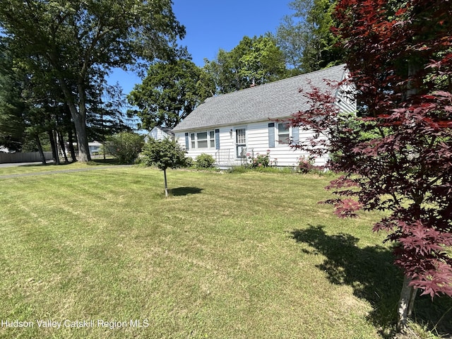 1 Huguenot Rd, Tillson, NY 12486 - view of front of home featuring a front lawn and roof with shingles