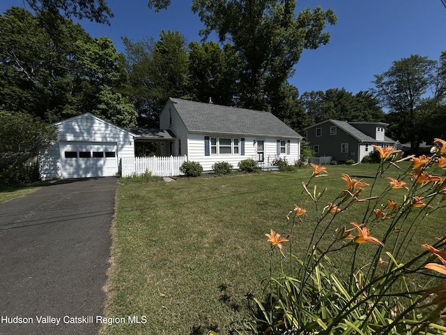 1 Huguenot Rd, Tillson, NY 12486 - view of front facade featuring a garage, asphalt driveway, and a shingled roof