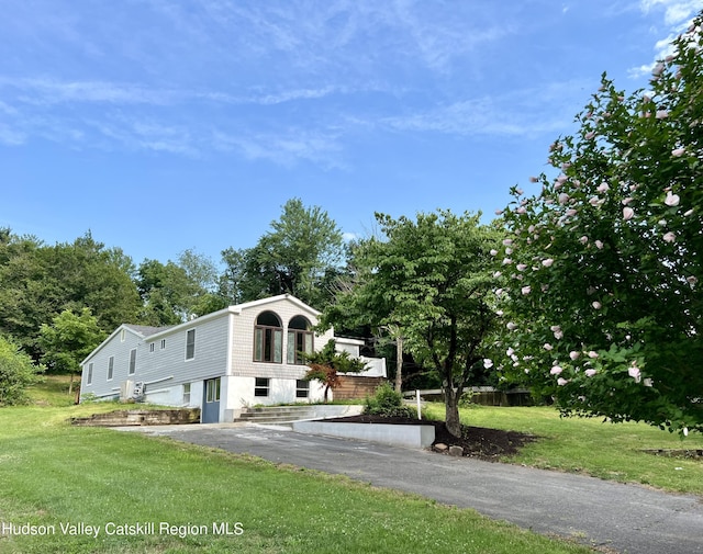 view of front of house with a front lawn