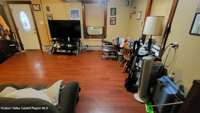 living room featuring cooling unit and wood-type flooring