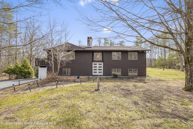 view of front of property with a chimney