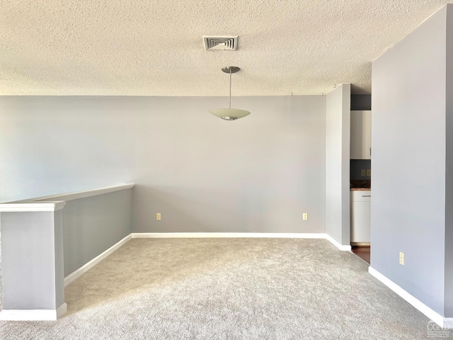 85 Riverview, Port Ewen, NY 12466 - spare room featuring carpet floors, a textured ceiling, and baseboards