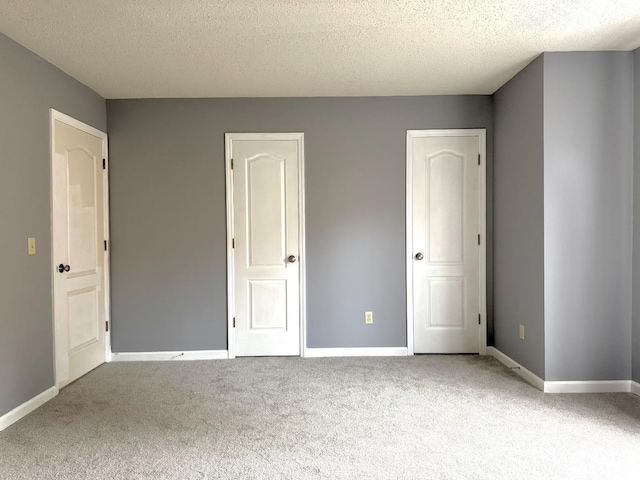 85 Riverview, Port Ewen, NY 12466 - unfurnished bedroom featuring carpet floors, baseboards, and a textured ceiling