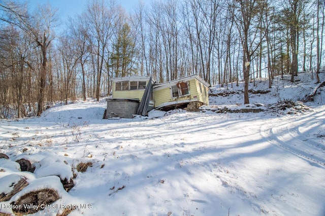 view of snow covered property