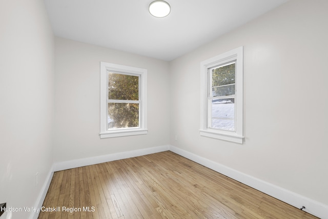 empty room with light wood-type flooring