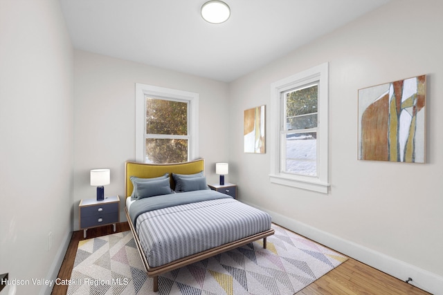 bedroom featuring hardwood / wood-style flooring