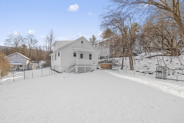 view of snow covered house