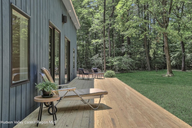 377 Pennsylvania Ave, Palenville, NY 12463 - wooden deck with a yard and a wooded view