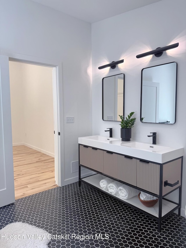 377 Pennsylvania Ave, Palenville, NY 12463 - bathroom with double vanity and baseboards