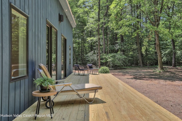 377 Pennsylvania Ave, Palenville, NY 12463 - wooden deck with a forest view