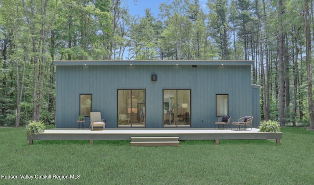 377 Pennsylvania Ave, Palenville, NY 12463 - rear view of house with a deck and a yard