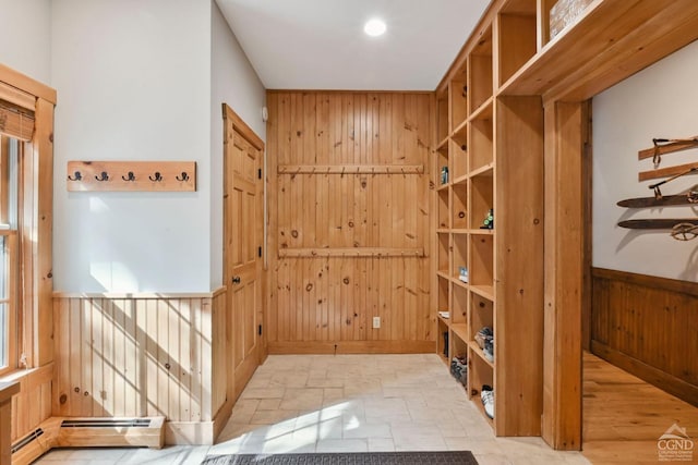 19 Twin Maples Ln, Windham, NY 12496 - mudroom with wooden walls and a baseboard heating unit