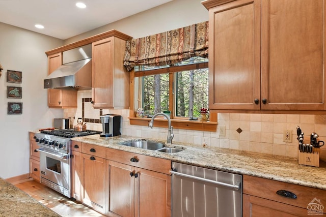 19 Twin Maples Ln, Windham, NY 12496 - kitchen with stainless steel appliances, a sink, exhaust hood, light stone countertops, and backsplash