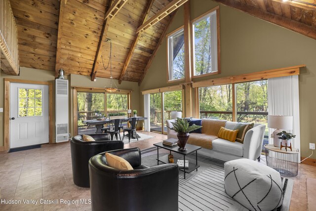 172 Stone Dock Rd, High Falls, NY 12440 - living room with high vaulted ceiling, wood ceiling, beamed ceiling, and baseboards