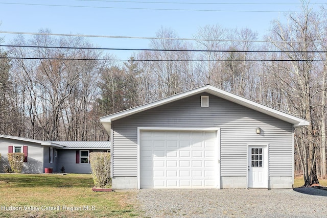 garage with a lawn