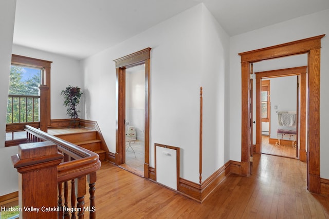 corridor featuring light hardwood / wood-style flooring