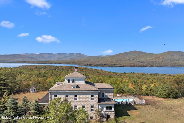 bird's eye view with a water and mountain view