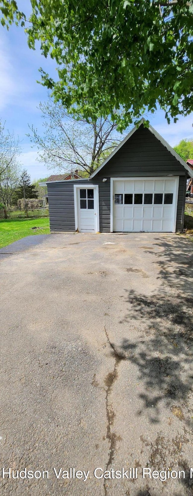 detached garage with fence