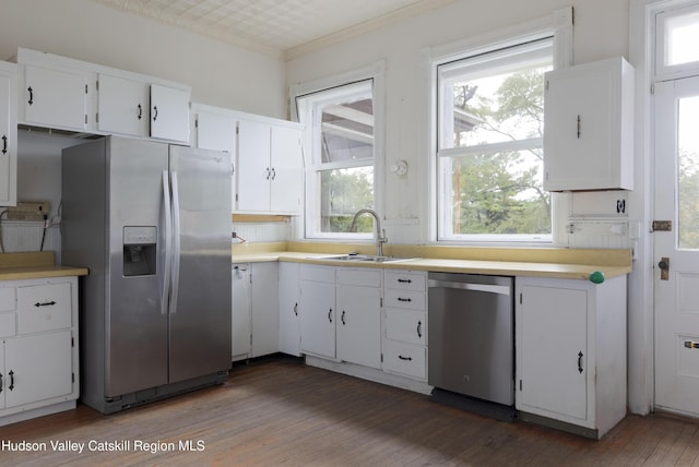 12 W Chestnut St, Kingston, NY 12401 - kitchen featuring stainless steel appliances, a sink, wood finished floors, and light countertops