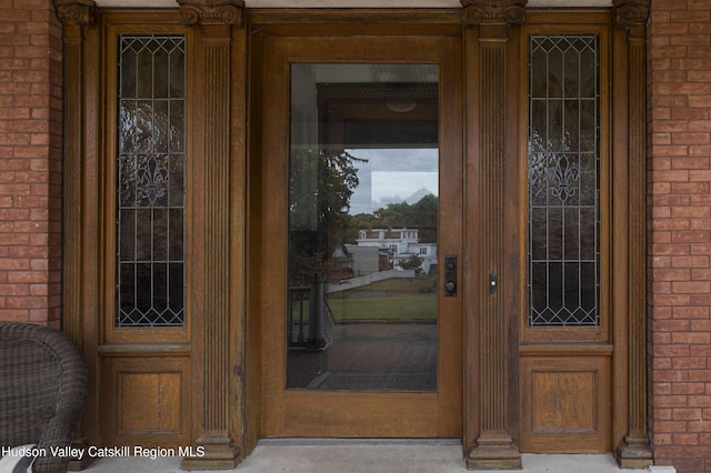 12 W Chestnut St, Kingston, NY 12401 - doorway to property featuring brick siding