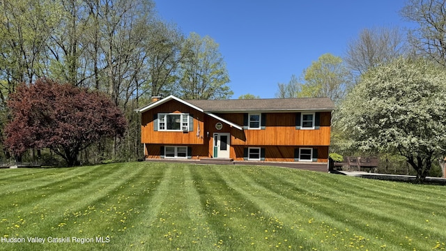 36 Susi Oval, Modena, NY 12548 - rear view of property with a chimney and a lawn