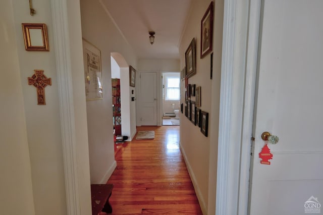 10345 Rte 32, Greenville, NY 12431 - hallway with light wood-style flooring, arched walkways, and baseboards