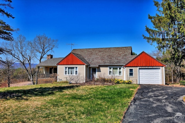 10345 Rte 32, Greenville, NY 12431 - view of front of house with board and batten siding, a garage, a front yard, and driveway