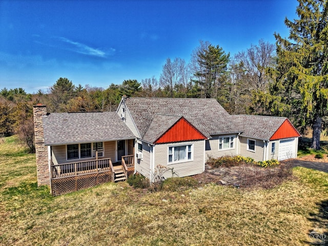 10345 Rte 32, Greenville, NY 12431 - view of front of home with a porch, a front lawn, a chimney, roof with shingles, and a garage