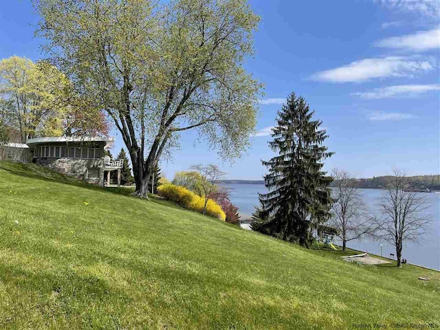 view of yard with a water view