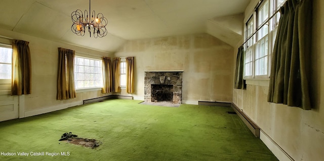 unfurnished living room featuring a baseboard radiator, a stone fireplace, a notable chandelier, vaulted ceiling, and carpet