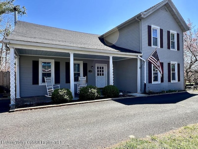 traditional-style house with a porch