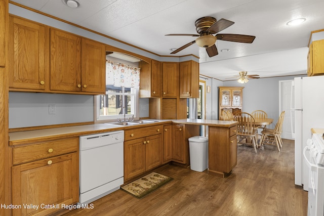 19 Pompeys Cave Rd, High Falls, NY 12440 - kitchen featuring white dishwasher, a sink, ceiling fan, range, and brown cabinets