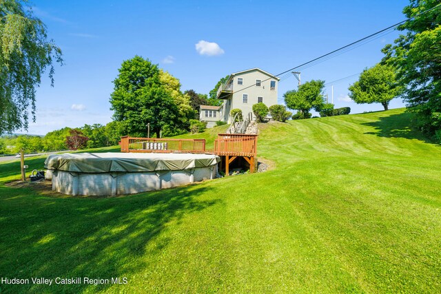 19 Pompeys Cave Rd, High Falls, NY 12440 - view of grassy yard featuring a covered pool and a deck