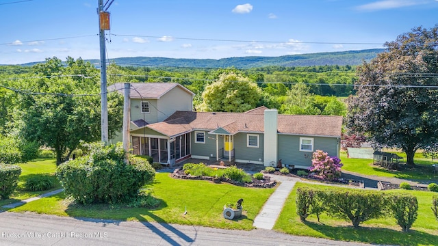 19 Pompeys Cave Rd, High Falls, NY 12440 - view of front of house with a sunroom, a front yard, and a mountain view