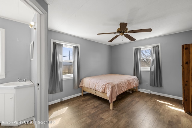 19 Pompeys Cave Rd, High Falls, NY 12440 - bedroom featuring wood finished floors, a sink, baseboards, and a ceiling fan