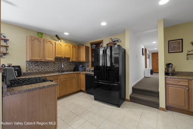 19 Pompeys Cave Rd, High Falls, NY 12440 - kitchen with black appliances, backsplash, dark countertops, recessed lighting, and a sink
