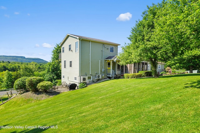 19 Pompeys Cave Rd, High Falls, NY 12440 - rear view of house featuring a lawn, a sunroom, and a patio