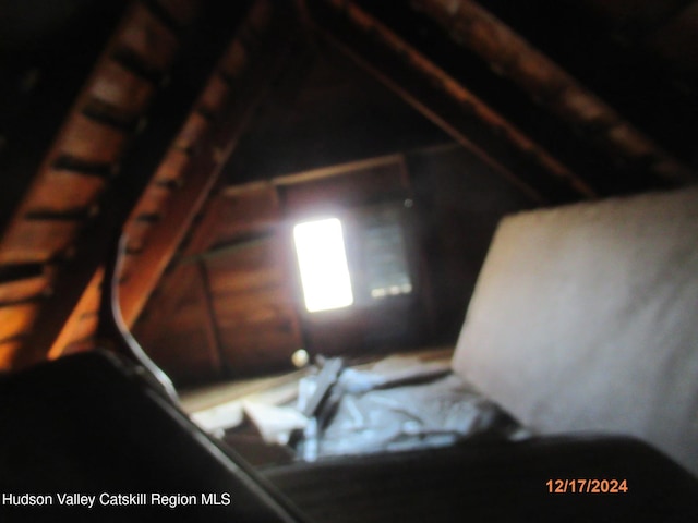 view of unfinished attic