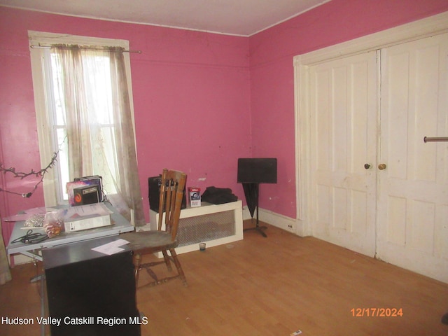 office space with wood finished floors
